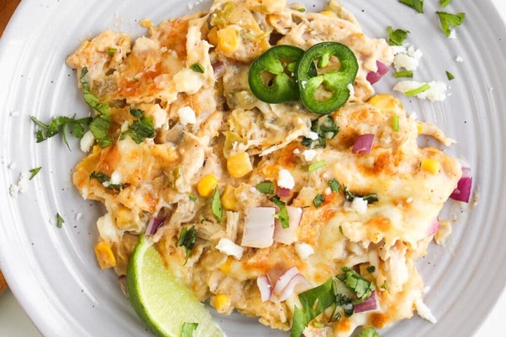 A close up shot of chicken enchilada.