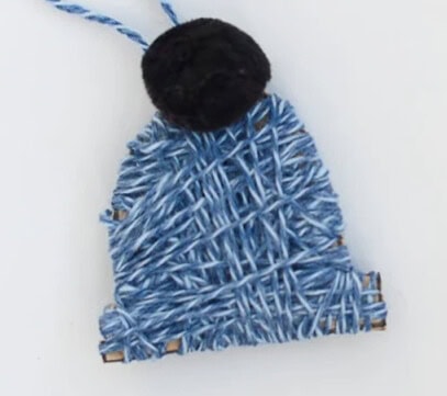 A close up shot of yarn ornament.