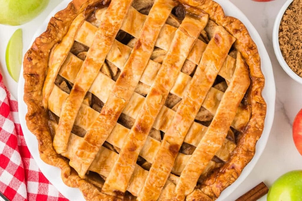 Top view of apple pie with golden lattice crust.