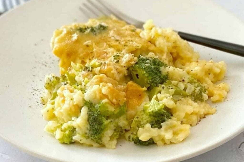 Broccoli cheese rice casserole on a plate.