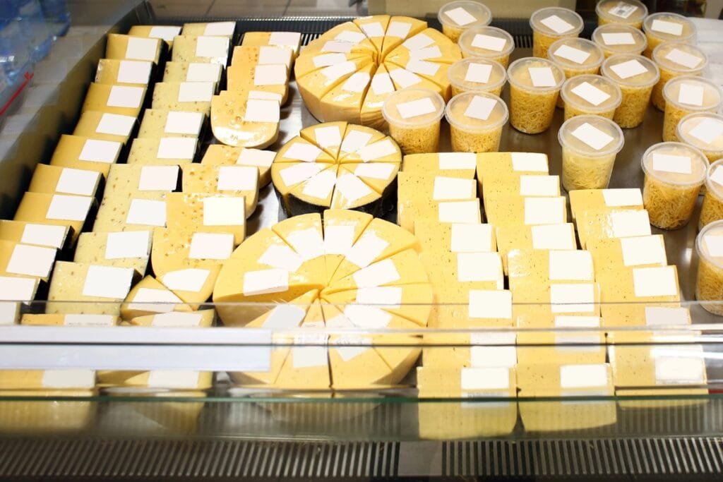 Variety of cheeses displayed.