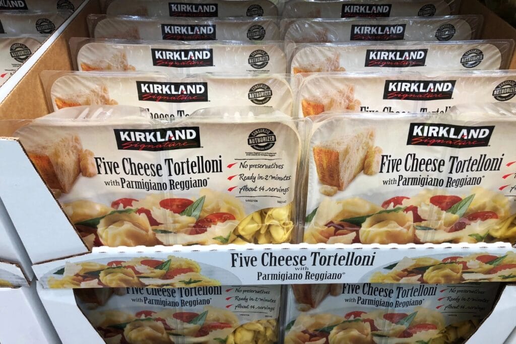 Cheese tortellini on a store shelf display.