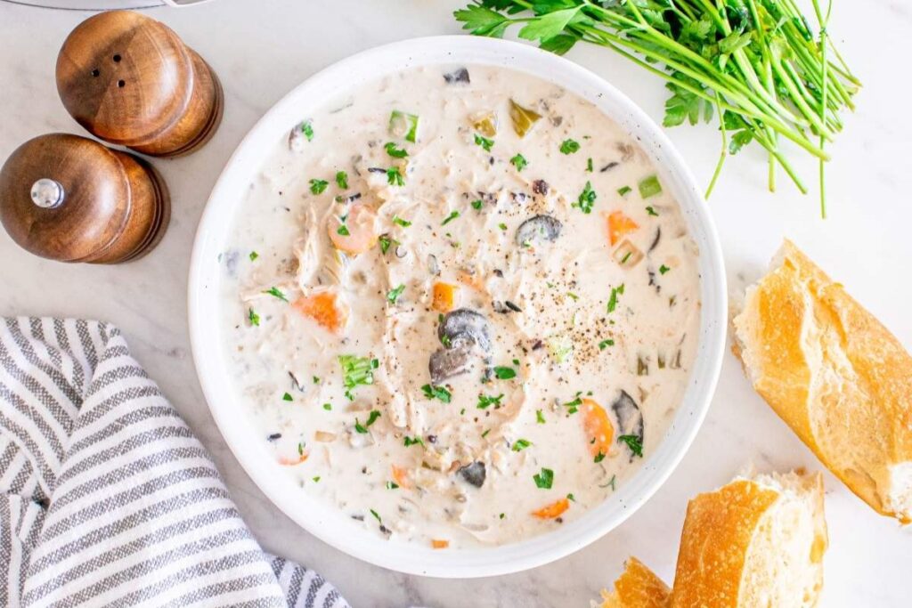 Chicken and wild rice creamy soup in a bowl.