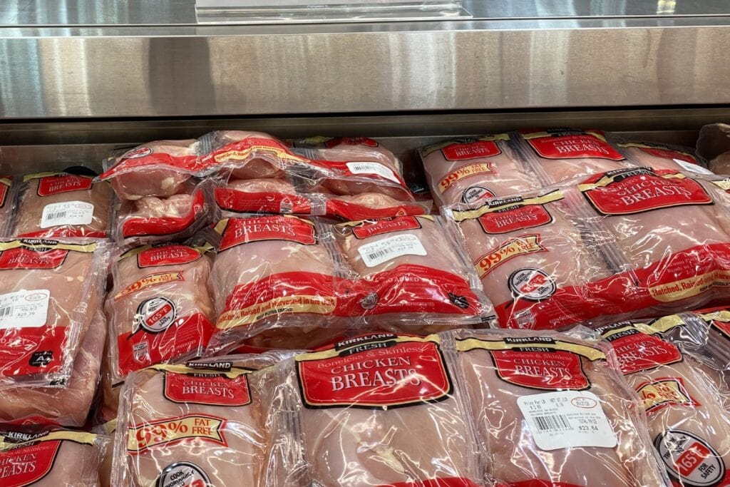 Chicken breast in the grocery store freezer section.