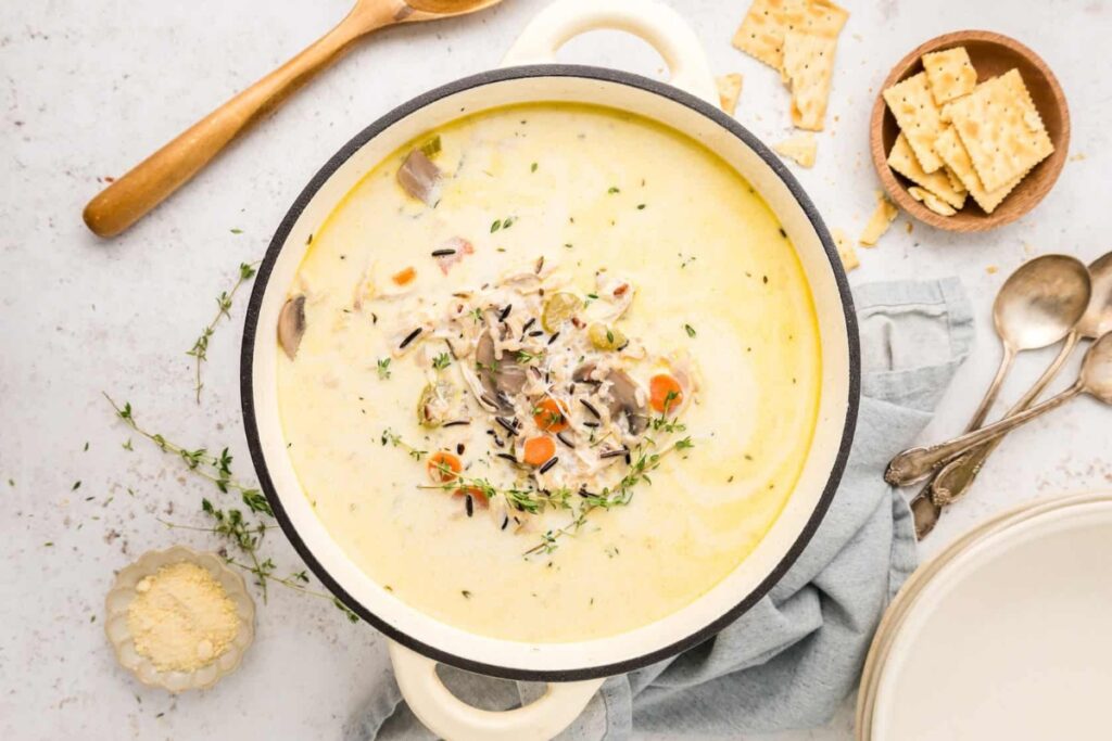 Chicken mushroom wild rice soup in a pot.