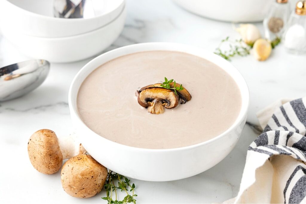 Cream of mushroom soup served in a bowl.