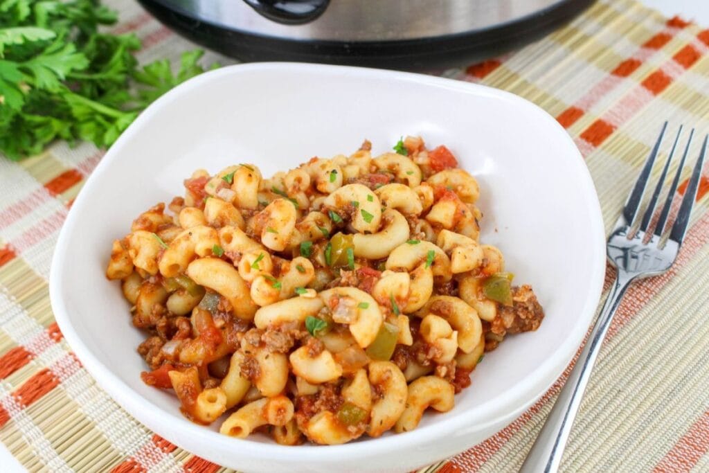 Crock Pot goulash in a white bowl.
