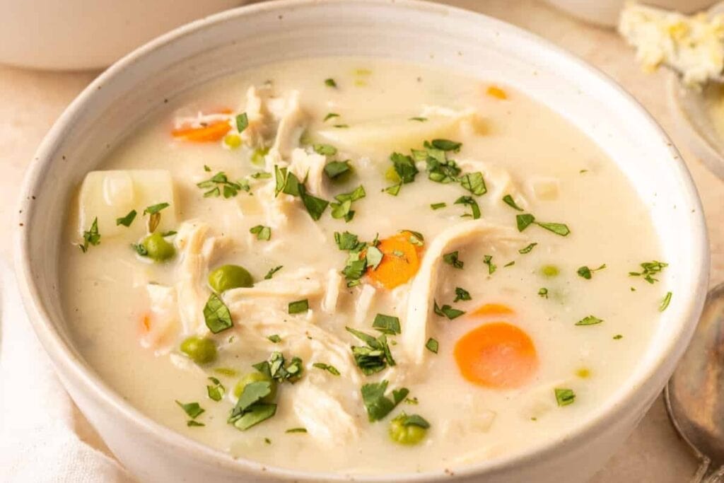Chicken pot pie soup in a bowl.