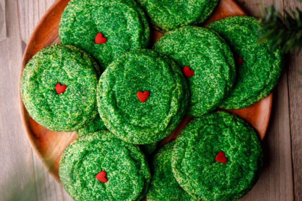 Grinch cookies on a plate.