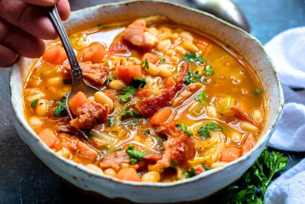 Ham and bean soup in bowl.