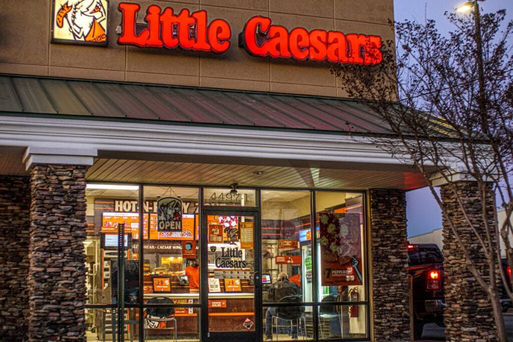 Little Caesars food chain store front view with logo.