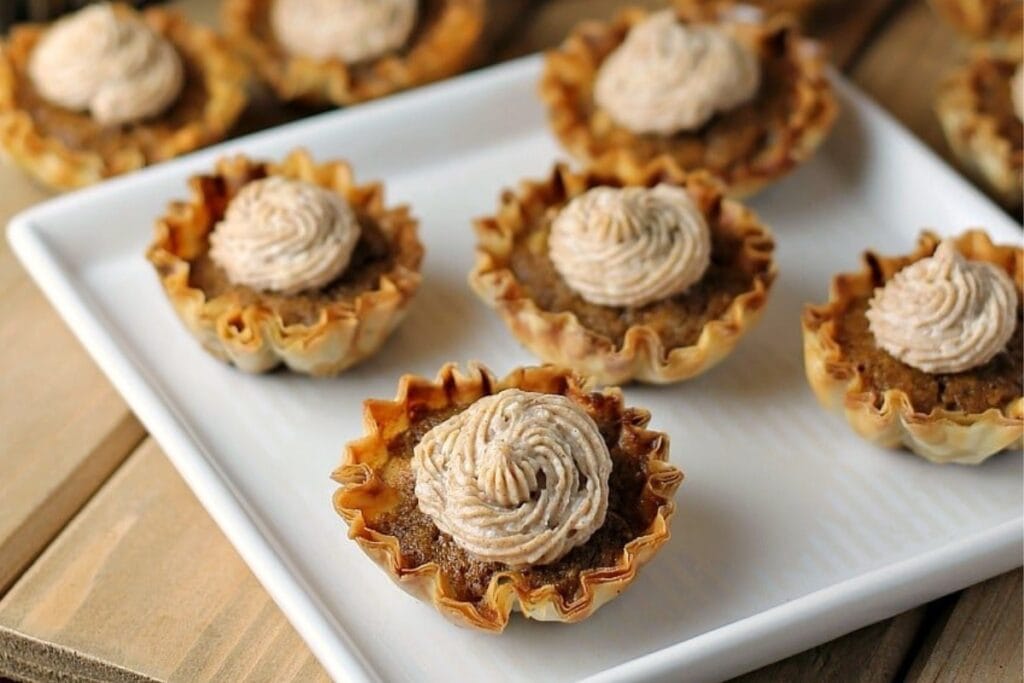 Mini sweet potato pies on a plate.