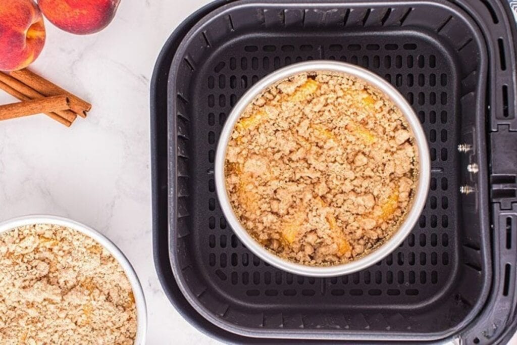 Peach crisp in an air fryer.