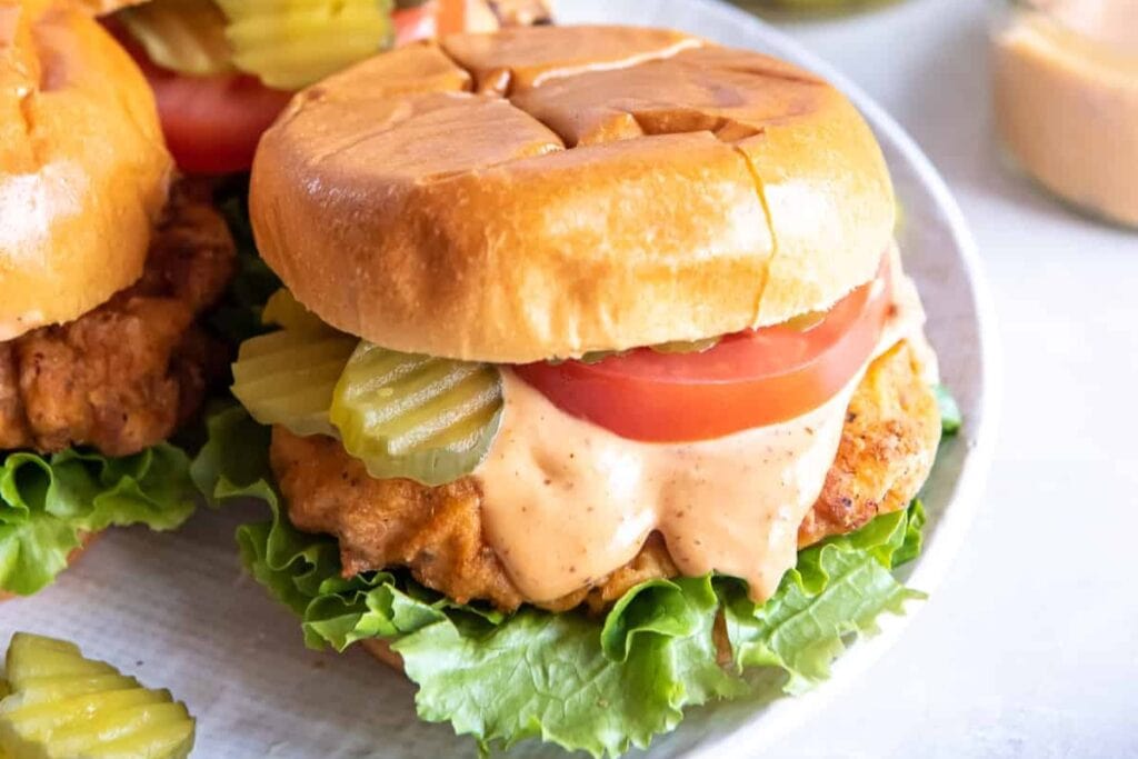 Close-up of pickle-brined chicken sandwich.
