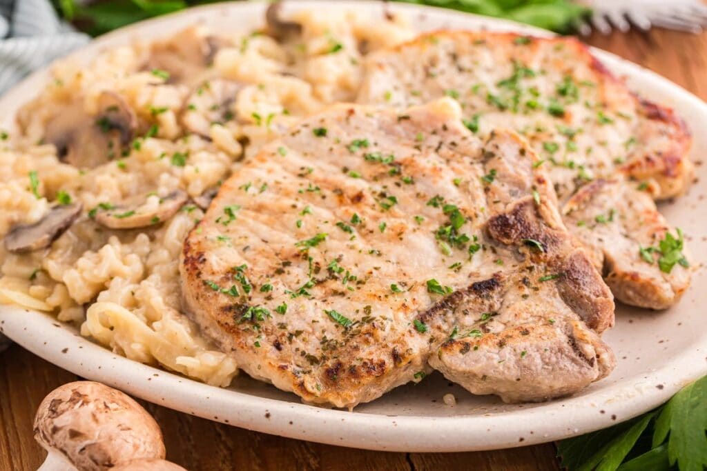 Pork chop casserole served on a plate.