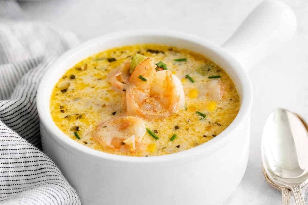 Shrimp and corn chowder soup in a bowl.
