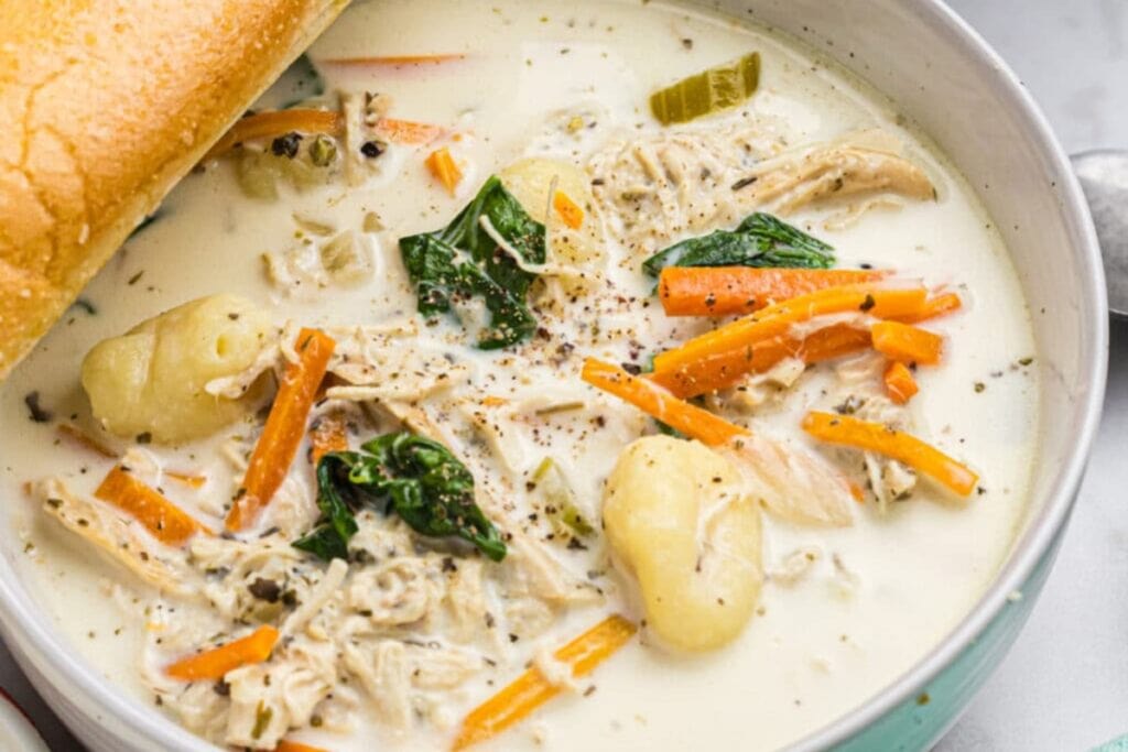 Chicken gnocchi soup in a bowl.