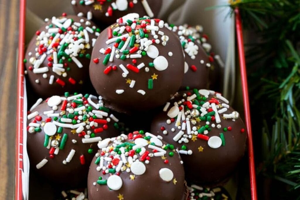 A close up shot of cake truffles.