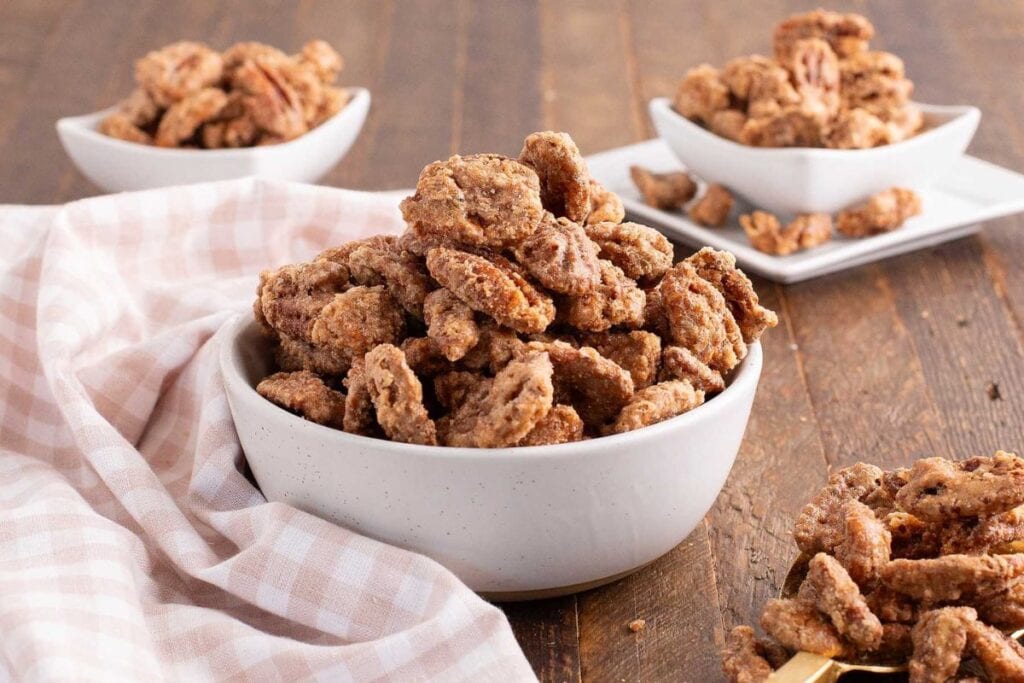 A close up shot of candied pecans.