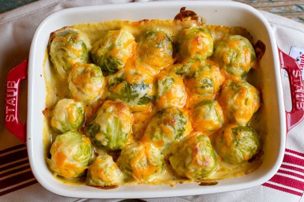 A close up shot of cheesy brussels sprouts.