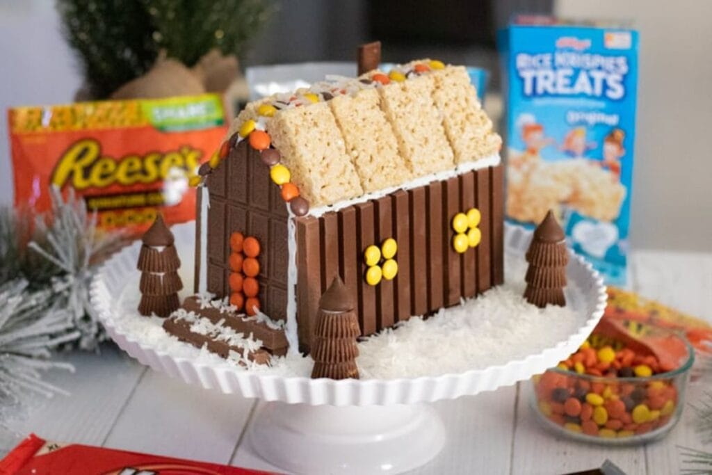 Christmas candy cabin made with Kit Kats, Rice Krispies Treats, and Reese's Pieces.
