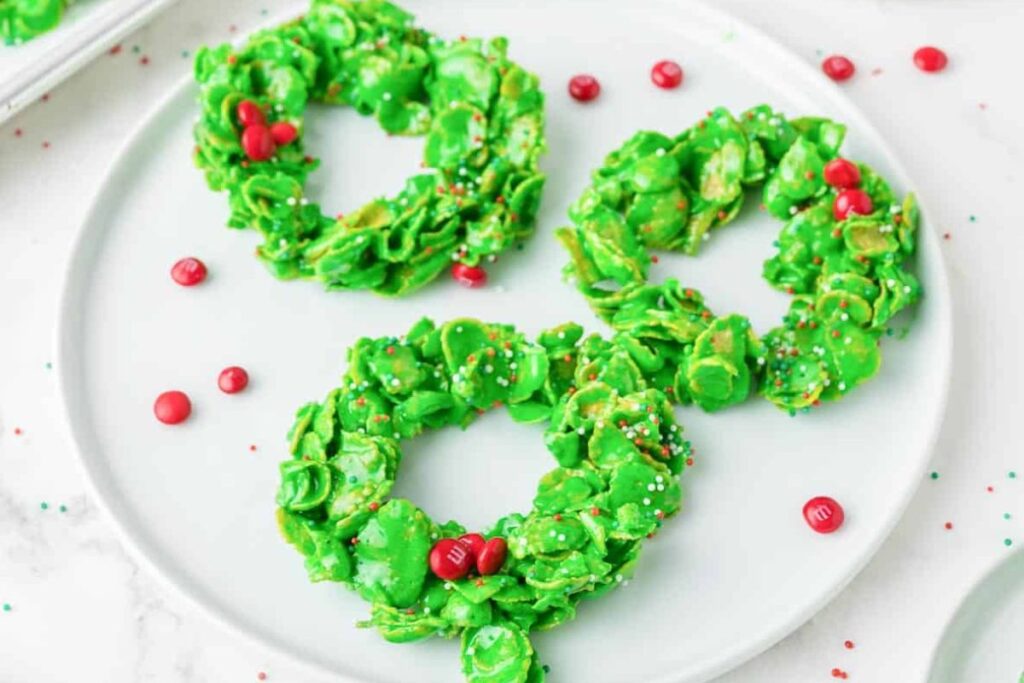 A close up shot of Christmas wreath cookies.