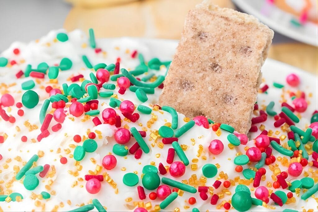 Christmas dip with red and green sprinkles and a cinnamon square.