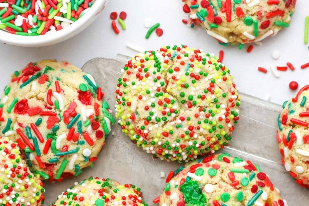 Christmas sprinkle sugar cookies with red, green, and white sprinkles.
