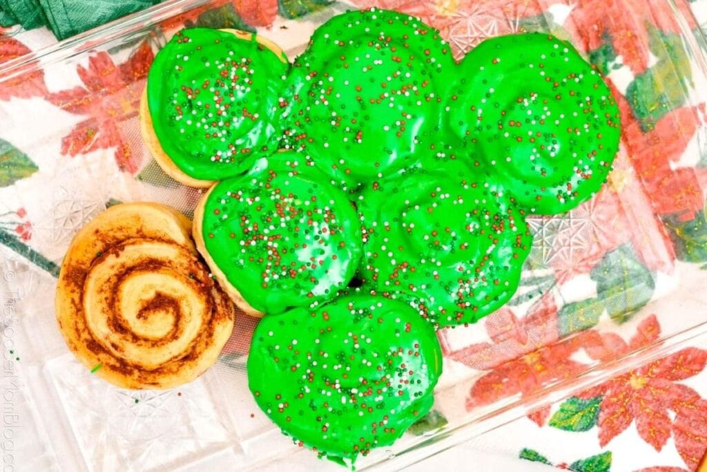 A close up shot of Christmas tree cinnamon rolls.