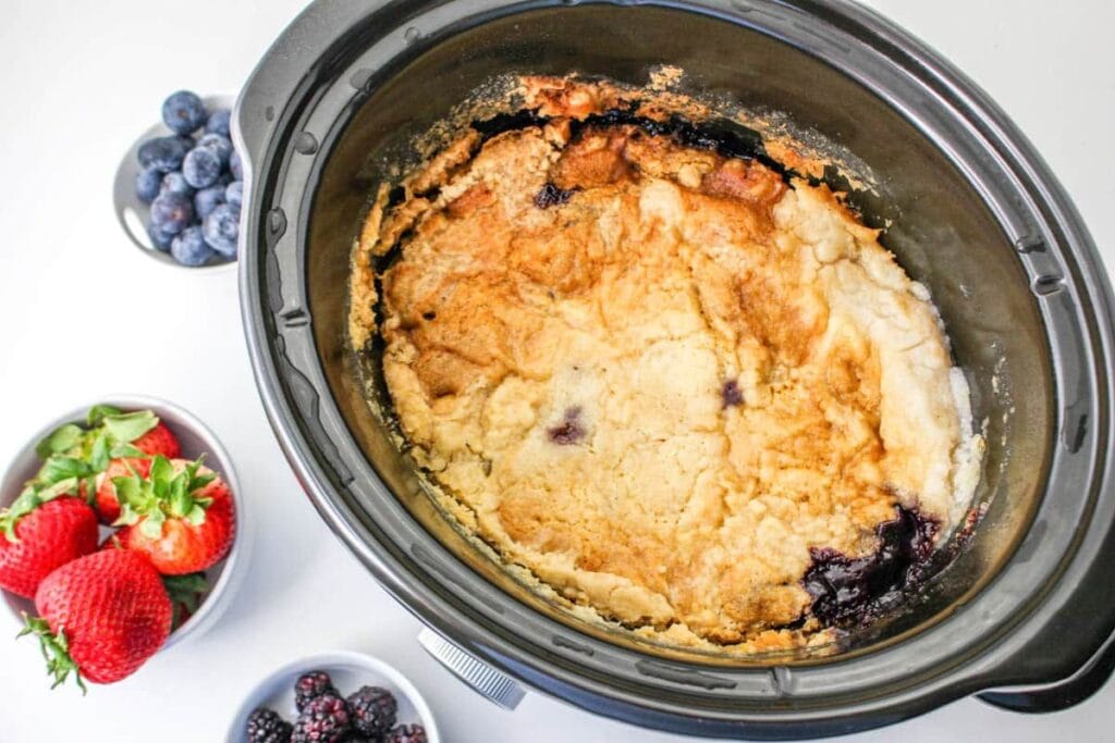 A close up shot of cobbler with berries.