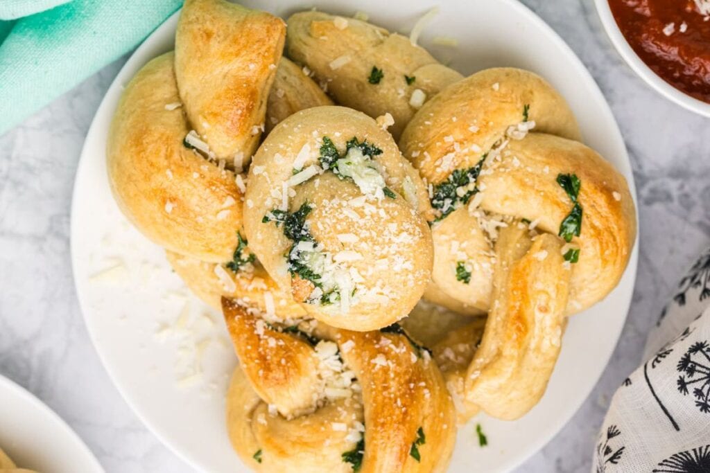 A close up shot of garlic knots.