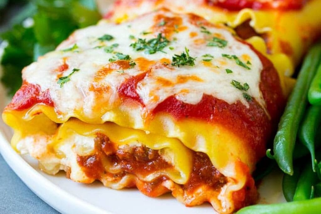 A close up shot of lasagna roll ups.
