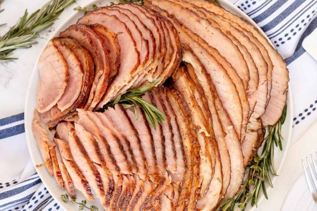 A close up shot of glazed spiral ham.
