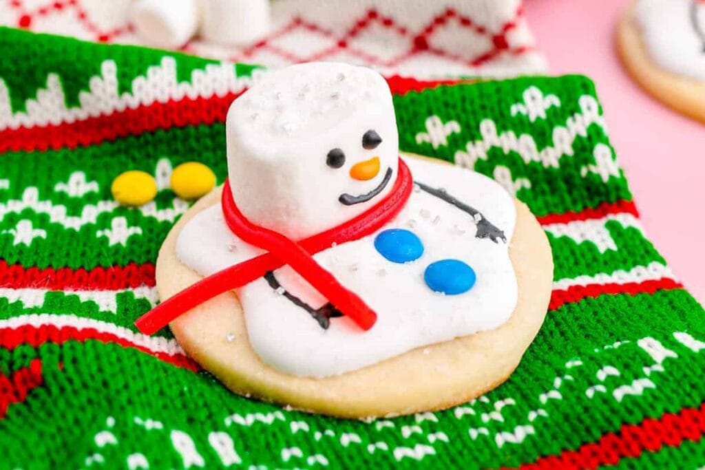 A close up shot of snowman cookies.