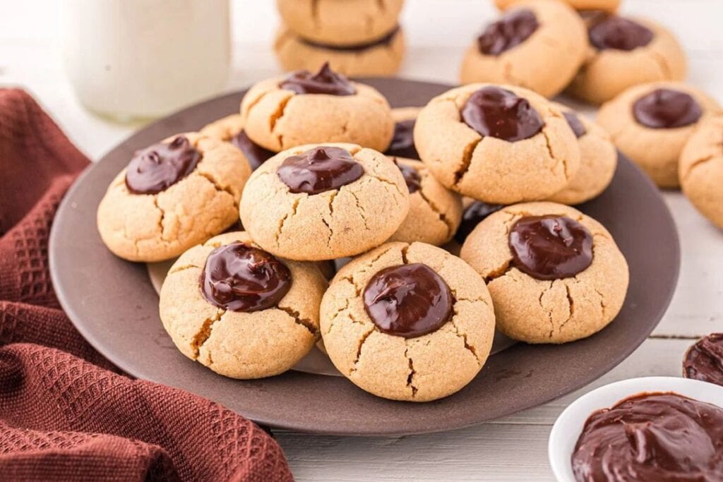 A close up shot of thumbprint cookies.