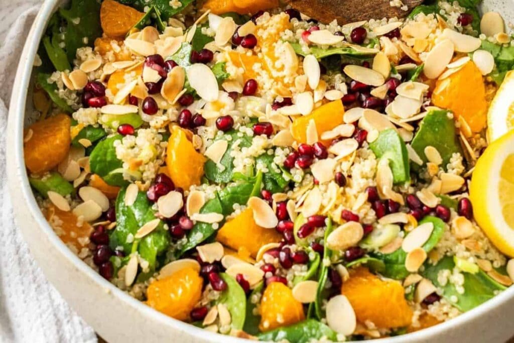A close up shot of quinoa and spinach salad.