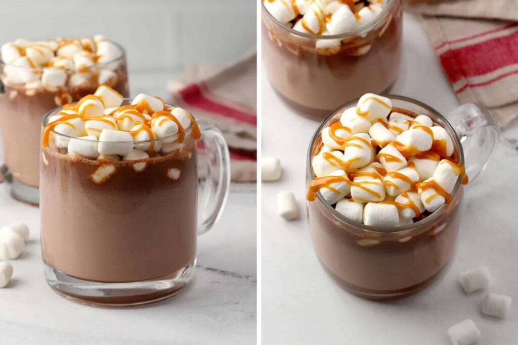 Two clear mugs of hot chocolate with marshmallows and caramel drizzle.
