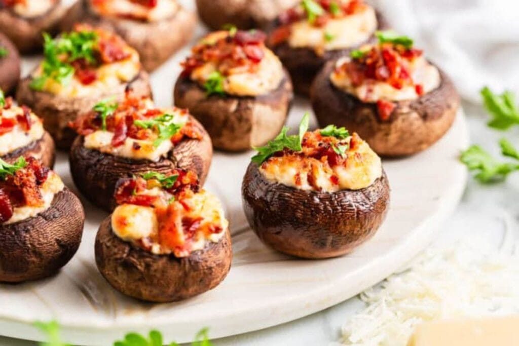 A close up shot of stuffed mushrooms.