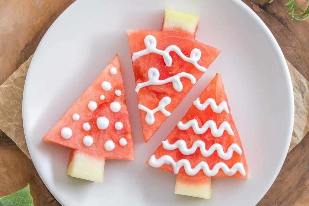 A close up shot of watermelon Christmas trees.