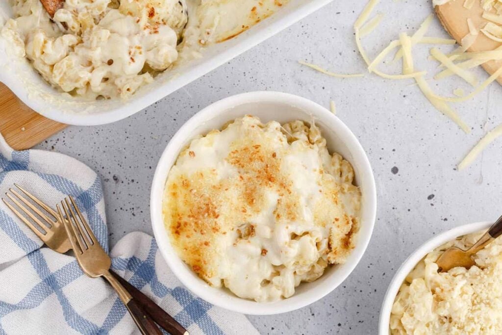 Baked white cheddar mac and cheese in a bowl.