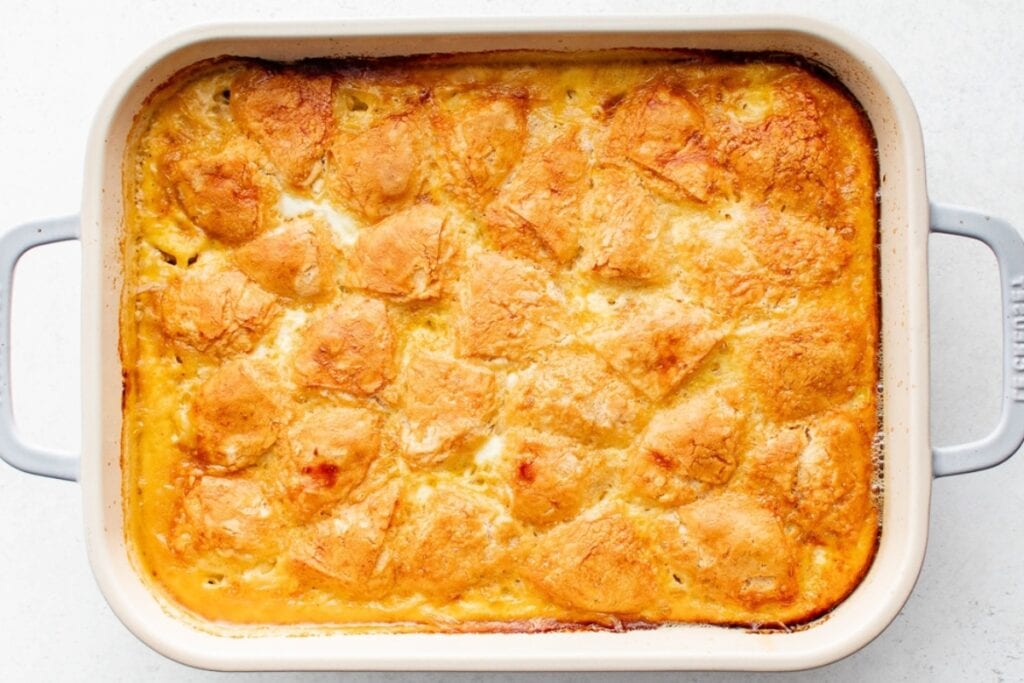 Top view of biscuits and gravy casserole in a baking dish.