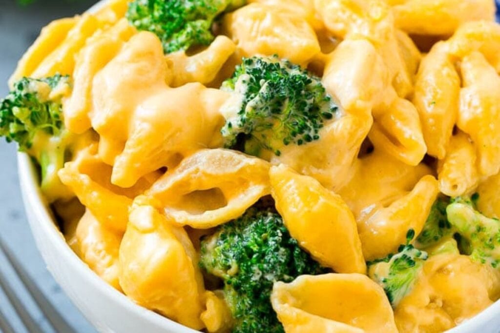 Close-up of broccoli mac and cheese in a bowl.