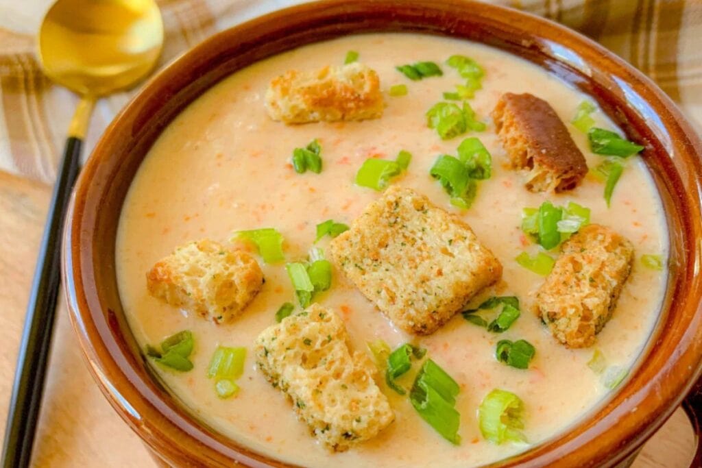 Cheddar soup in a bowl.