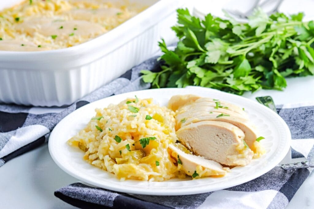 Chicken and rice casserole on a white plate.