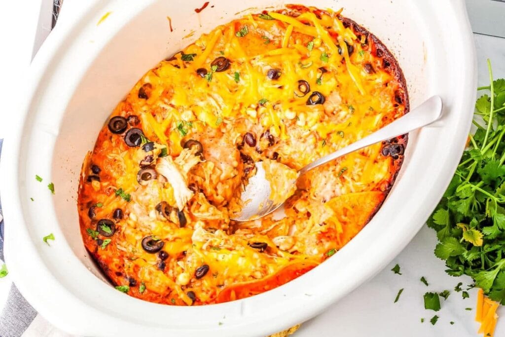 chicken enchilada casserole topped with cheese