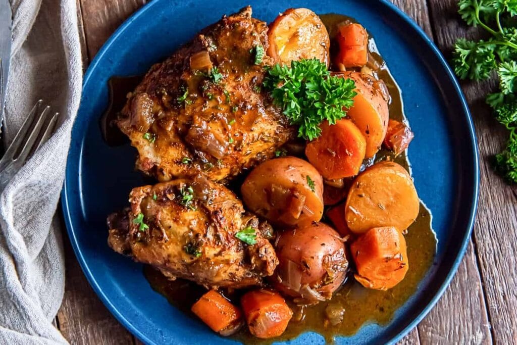 Chicken La Maison served on a plate.