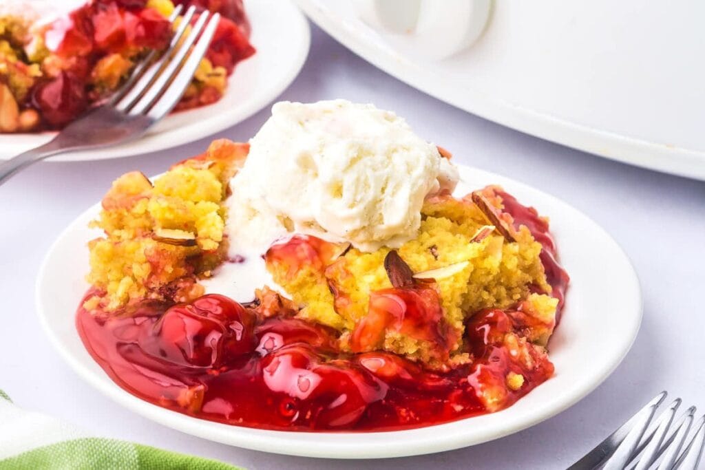 Crock Pot cherry dump cake served on a plate.