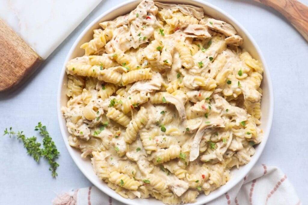 Crock pot garlic parmesan chicken pasta in a bowl.