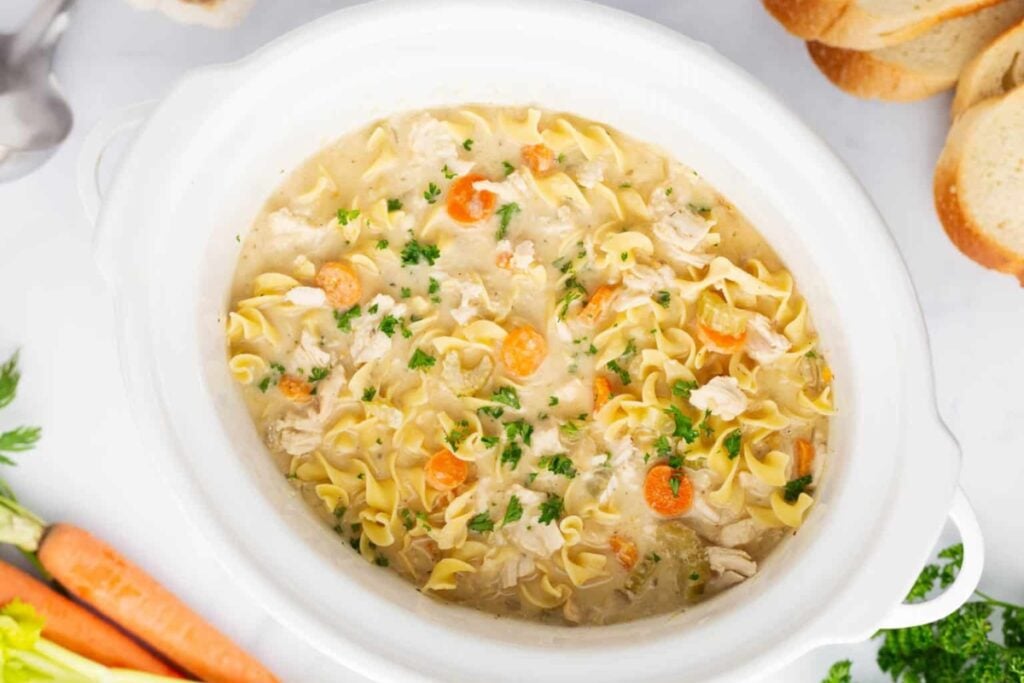 Chicken noodle soup in a crockpot.