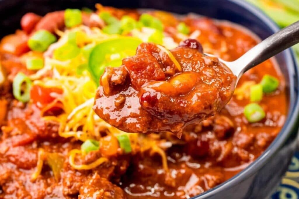 Close up spoonful of crockpot chili.